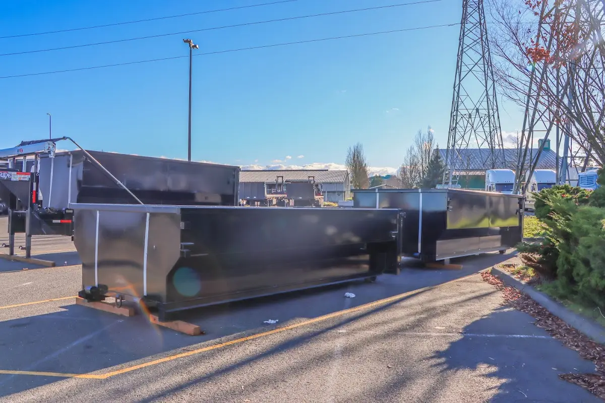 Roll-off dumpster ready for waste disposal at job site for 2 Yard Dumpster Rental in Brentwood